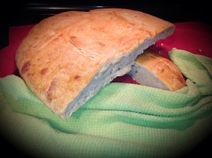 This is a huge, crusty loaf of San Francisco Sour Dough Bread.